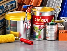 Latas de tinta e rolos de pintura